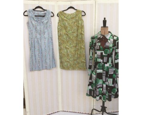 Various early 1970's and other vintage dresses to include a green and black abstract design shirt dress, with brown pussy bow