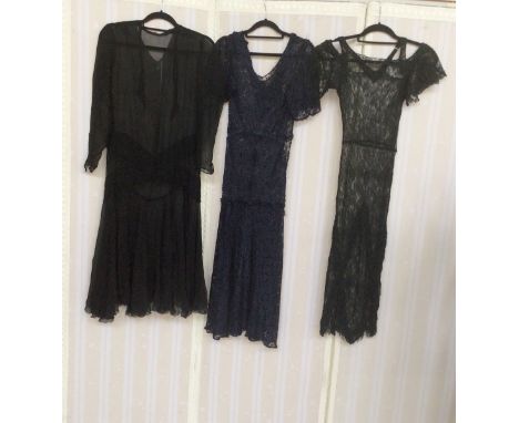 Two 1920's lace dresses, lacking underskirts and with some damage, a 1920's black chiffon dress (with damage), a black opera 