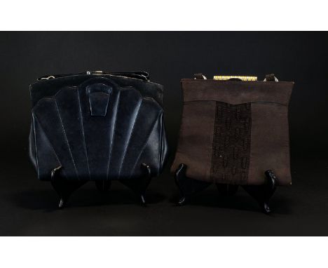 Two Art Deco Evening Bags Each circa 1930's. The first of soft black leather with black suede back and inserts - top handle w