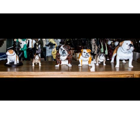 British Bulldog Interest A Collection Of Ceramic And Resin Figures Six in total to include two seated ceramic bulldogs by Man