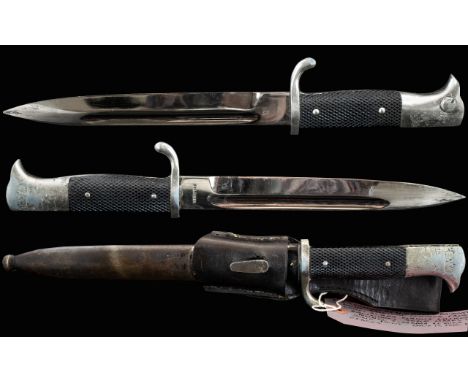 World War II German Army Dress Bayonet with Original Leather Frog, Clean Blade, Maker Solingen. Condition - Some Marks on Pom