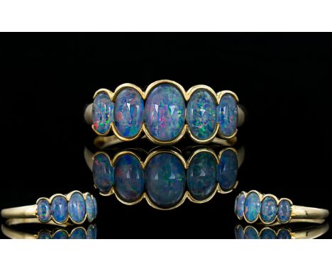 Contemporary and Attractive Five Stone Blue Opal Set Ring, fully hallmarked for 9ct 375. Ring size R, as new condition.