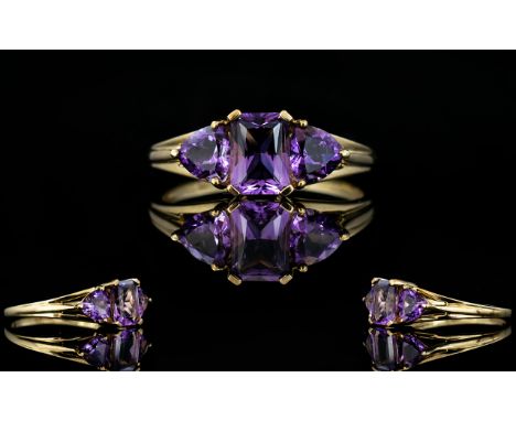 Ladies - Nice Quality and Attractive 9ct Gold - 3 Stone Amethysts Set Dress Ring, The Amethyst of Excellent Colour and Clarit