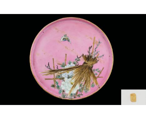 Oriental Ceramic Charger Large circular tray in pink glazed ceramic decorated with floral and butterfly design. 14 inches dia