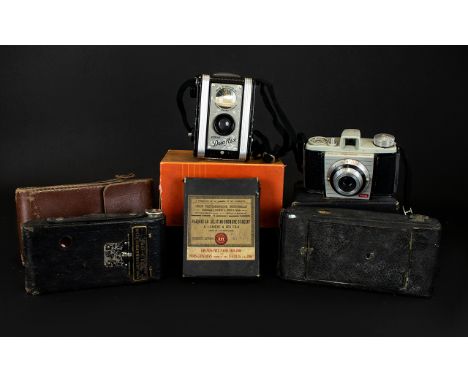 Photography Interest A Collection Of Associated Items To include Kodak Bantam camera complete with box and paperwork, Kodak D
