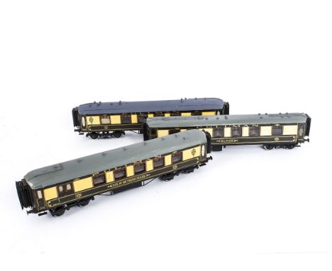 Three Leeds (LMC)-based 0 Gauge Pullman Coaches, built to earlier standards, with lithographed paper sides on wooden bodies, 