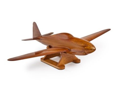 Wind Tunnel ModelMaquette de SoufflerieA wind tunnel model with a study. Finely crafted in walnut slats. Single engine monopl