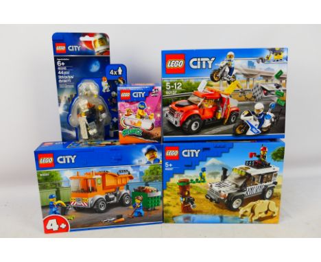 Lego - Four boxed factory sealed Lego' City' sets with a carded 'City' minifigure pack. Lot consists of #60137 Tow Truck Trou