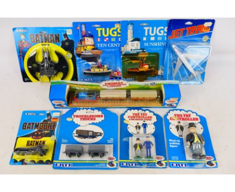 ERTL - An assortment of 8 diecast and plastic items to include #2945 Batwing, #1064 Batmobile, #4040 The Fat Controller & Sta