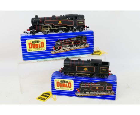 Hornby Dublo - 2 x boxed 3 rail locomotives, an 0-6-2 tank engine in BR black livery 69567 # EDL17 and a 2-6-4 tank engine in