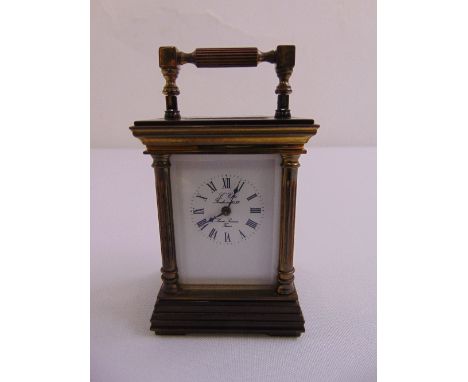 L'Epee a miniature brass carriage clock, white enamel dial with Roman numerals
