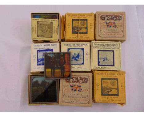 A quantity of early 20th century lantern slides to include Boer War, Animals and Japan and its people some in original boxes