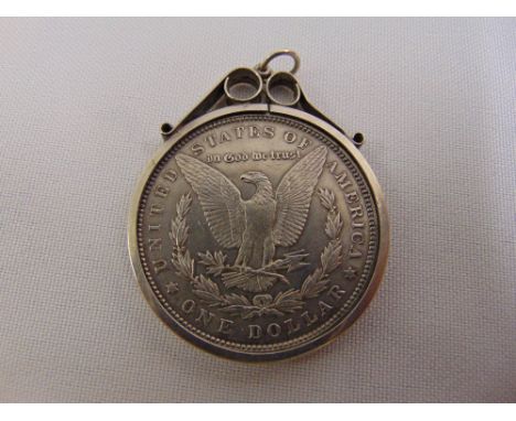 1889 Unites States Morgan silver dollar loose set in a pendant mount
