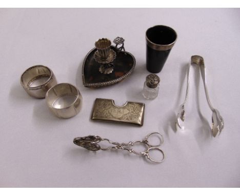 A quantity of silver to include a tortoiseshell and silver heart shaped chamber stick by William Comyns, a silver mounted hor