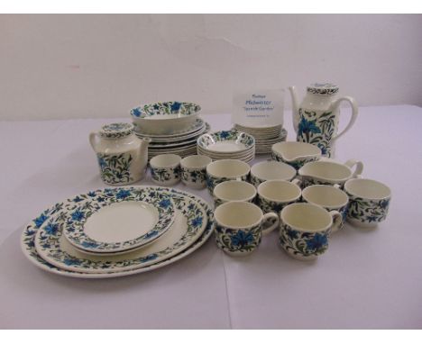A part dinner and tea service Midwinter Spanish Garden pattern designed by Jessie Tait to include plates, bowls, cups and sau