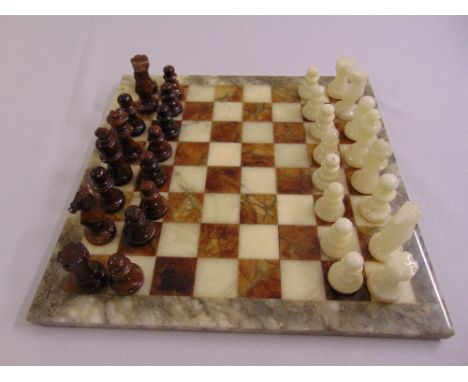 A coloured stone chess set and board