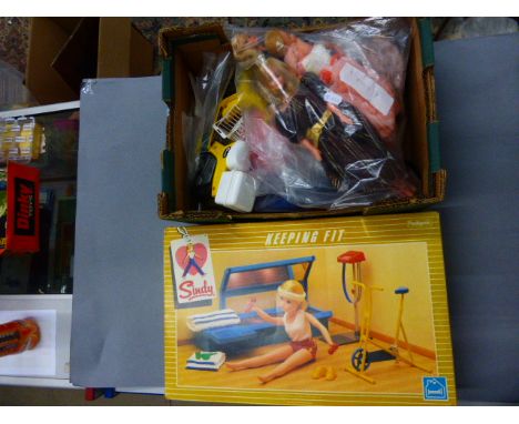 Four vintage Sindy & Barbie dolls, one Paul doll, fifteen vintage Sindy outfits, plus a boxed Sindy Keeping Fit set & a Sindy