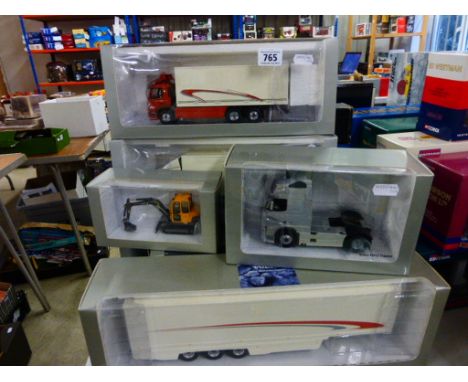 Thirteen boxed and licenced Volvo 1:43 die cast model vehicles to include Volvo FL6, Volvo FH12 Tractor and Volvo FM9 Distrib