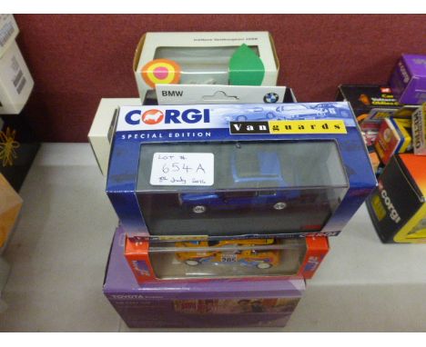 A collection of nine model die cast boxed and cased scale model cars to include; Corgi Limted Edition Collectables 1:36 scale