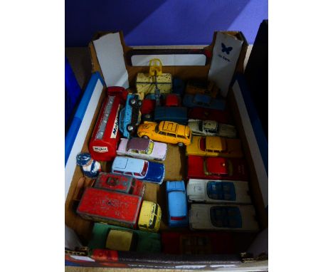 A collection of approximately twenty four mainly Corgi vintage play worn die cast scale model vehicles to include Austin A40 