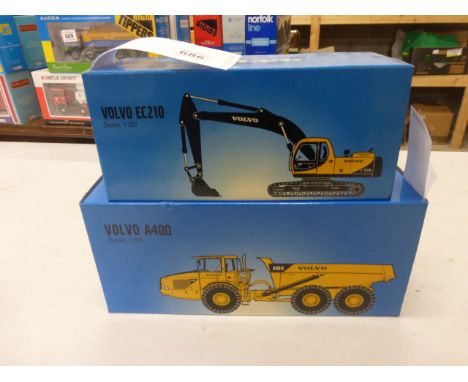 Two boxed Volvo Construction 1:50 scale die cast vehicles to include Volvo A40D and Volvo EC210