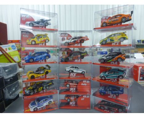 17 Boxed SCX 1:32 Scale Slot Cars to include; Ford Escort MKII, SCX Tuning Car 2, Seat Leon BTCC, Renault Megane Trophy - mos