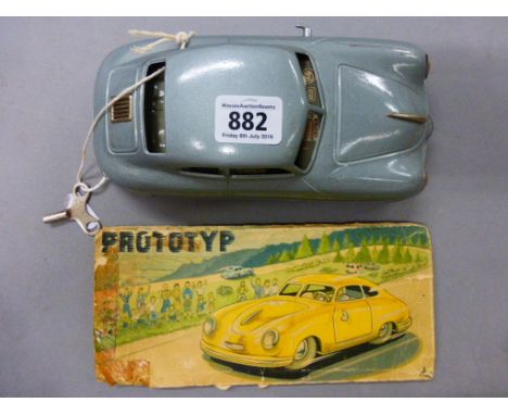 Vintage clockwork tin plate Porsche JNF Prototype mid 1950's circa with damaged original box and key