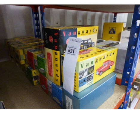 A collection of fourteen boxed 1:43 scale Vanguards die cast vehicles to include six 1950s - 1960s Classic Popular Saloon Car