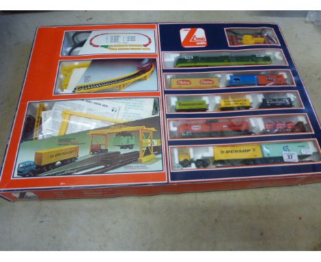 Model Railway - Boxed Lima OO gauge train set to include Diesel engine and 8 x rolling stock with bridge and outer trade box