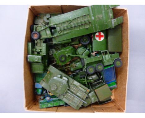 Collection of vintage Dinky diecast military vehicles with play ware