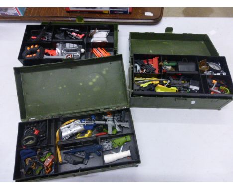 Three Action Man carry cases containing large quantity of accessories