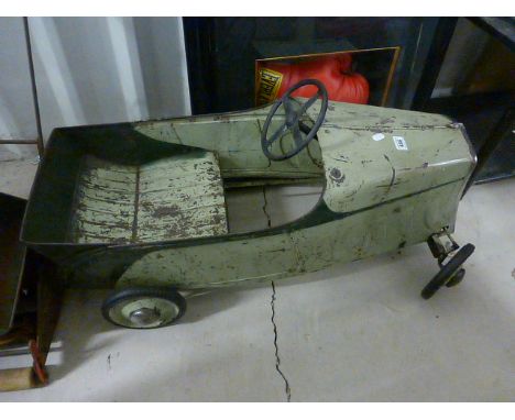 Vintage metal pedal car in green (needs restoration)