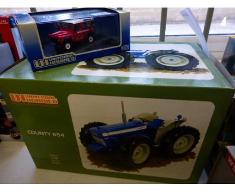 Two boxed limited edition boxed Universal die cast models comprising 1:43 Land Rover Defender; 90SW - French; Fire Brigade an