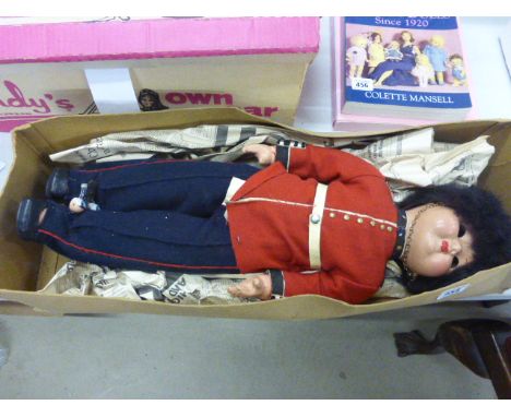 Vintage Guardsman doll in full uniform with bisque head and glass eyes (eyes are unattached from head)