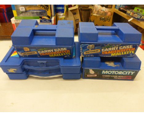 Five vintage Matchbox carry cases
