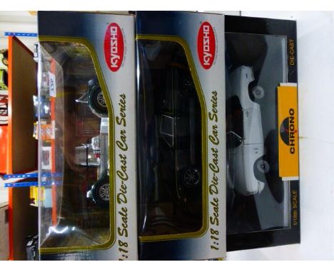 Two boxed limited edition Kyosho 1:18 scale die cast model car series; Lotus Europa Special (Black) and Caterham Super Specia