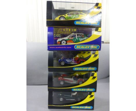 9 Boxed Scalextric Slot Cars including Sports ltd edition to include; C2645 Skoda Fabia WRC, C2410 Opal V8 Coupe, C2475A Opal