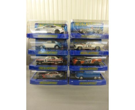 8 Boxed Scalextric Slot Cars to include; C3214 Holden L34 Torana, C3204 Volkswagen Beetle, C3517 Camaro GT-R, C3514 Bentley C