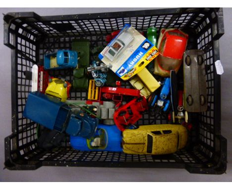 A collection of various approximately twenty four vintage play worn die cast and other vehicles to include; Corgi