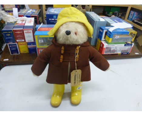 Vintage Paddington Bear in yellow hat and boots with tag