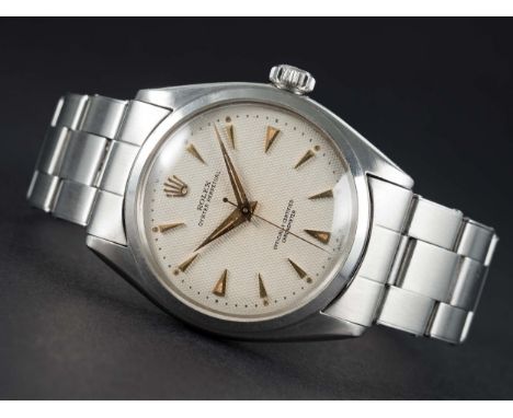 A RARE GENTLEMAN'S STAINLESS STEEL ROLEX OYSTER PERPETUAL BRACELET WATCHCIRCA 1953, REF. 6084 SILVER "HONEYCOMB" DIAL Movemen