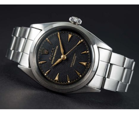 A RARE GENTLEMAN'S STAINLESS STEEL ROLEX OYSTER PERPETUAL BRACELET WATCHCIRCA 1955, REF. 6580 BLACK "HONEYCOMB" DIAL, ACCOMPA