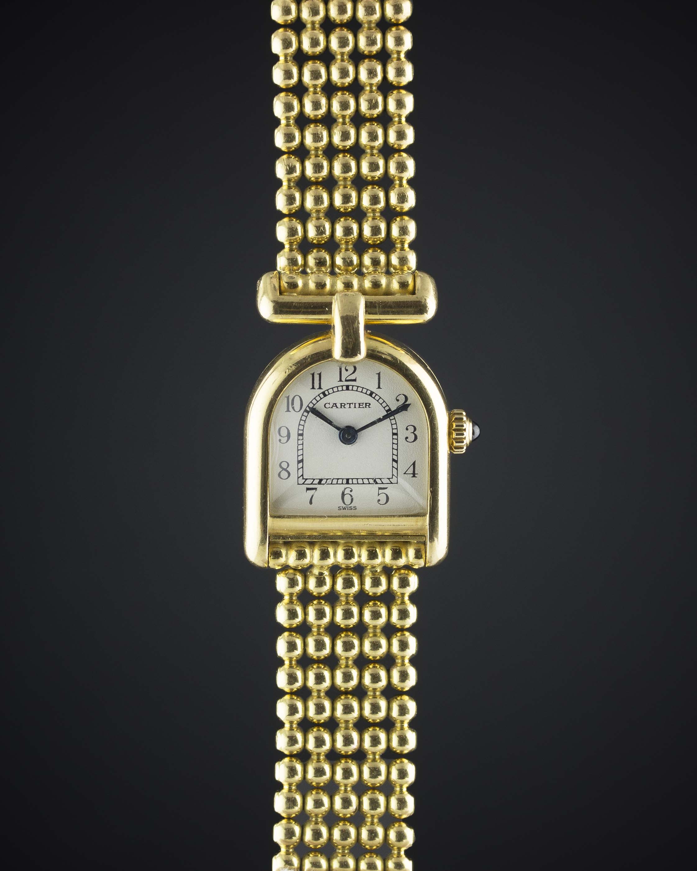 A LADIES 18K SOLID GOLD CARTIER PARIS CALANDRE