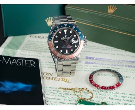 A RARE GENTLEMAN'S STAINLESS STEEL ROLEX OYSTER PERPETUAL DATE GMT MASTER BRACELET WATCHDATED 1974, REF. 1675 WITH MK2 MATT D