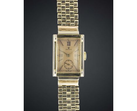 A RARE GENTLEMAN'S 18K SOLID PINK GOLD ROLEX BRACELET WATCHCIRCA 1940s, WITH ORIGINAL ROLEX TAGSMovement: 17J, manual wind, s