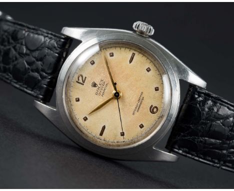 A RARE GENTLEMAN'S LARGE SIZE STAINLESS STEEL ROLEX OYSTER PERPETUAL "BUBBLE BACK" CHRONOMETER WRIST WATCHCIRCA 1952, REF. 60