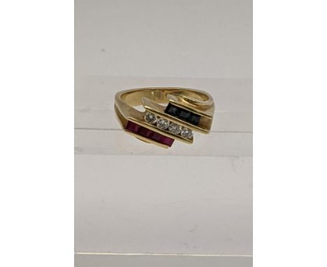 A 14ct gold ring set with diamonds, ruby and sapphires total weight 6gLocation: 