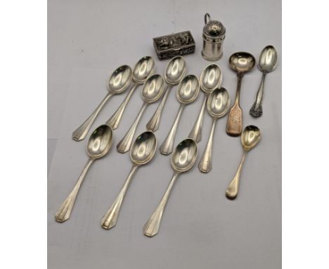 Mixed silver and white metal to include a silver pepper pot, an embossed trinket, a miniature sauce ladle, ten white metal co