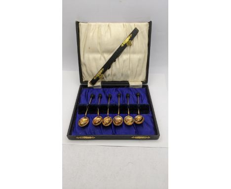 A set of six silver and enamel coffee spoons, hallmarked Birmingham 1928, 47.6gLocation: 