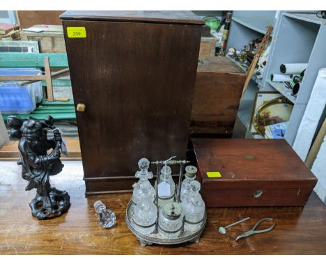 A Victorian writing slope with fitted interior, single inkwell, beech cupboard, a Victorian silver plated six-bottle cruet se